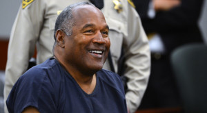 Reuters-OJ-Simpson-smiling-Las-Vegas-court-photog-Ethan-Miller