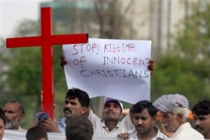 Pakistani Christians participate in a rally against the killings of their religious brethren during a weekend riot, Tuesday, Aug. 4, 2009, in Islamabad, Pakistan. Police questioned more than 200 people to determine if the rioting that killed eight Christians was spontaneous or planned by a militant group, a Pakistani official said. (AP Photo/Anjum Naveed)
