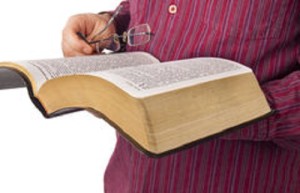 http://www.dreamstime.com/royalty-free-stock-photos-man-reading-bible-isolated-white-image29891618