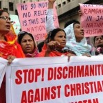 Activists of the National Christian party shout slogans in the support of a Christian girl who was accused of burning papers containing verses from the Koran, in Karachi on September 4, 2012. A Pakistani cabinet minister says he is “very hopeful” a young Christian girl accused of blasphemy will be released on bail later this week after spending more than three weeks in custody.  AFP PHOTO/Rizwan TABASSUM        (Photo credit should read RIZWAN TABASSUM/AFP/GettyImages)