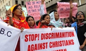 Activists of the National Christian party shout slogans in the support of a Christian girl who was accused of burning papers containing verses from the Koran, in Karachi on September 4, 2012. A Pakistani cabinet minister says he is "very hopeful" a young Christian girl accused of blasphemy will be released on bail later this week after spending more than three weeks in custody.  AFP PHOTO/Rizwan TABASSUM        (Photo credit should read RIZWAN TABASSUM/AFP/GettyImages)