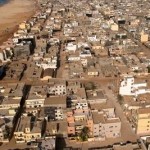 dakar_roofs_-_beach_ocean_5651584098