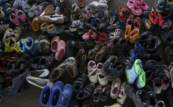 a_pile_of_children_shoes_captured_during_refugees_crisis._refugee_crisis._budapest_hungary_central_europe_6_september_2015