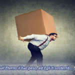 Chubby man delivering huge heavy box on back under great stress.
